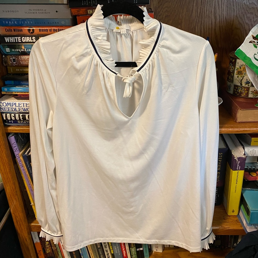 White cream top with ruffle detail from BODEN